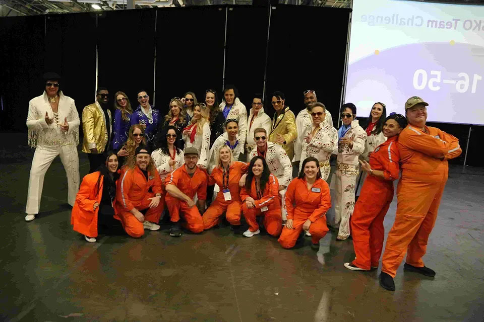 A team in costume celebrating at a Go Game corporate event